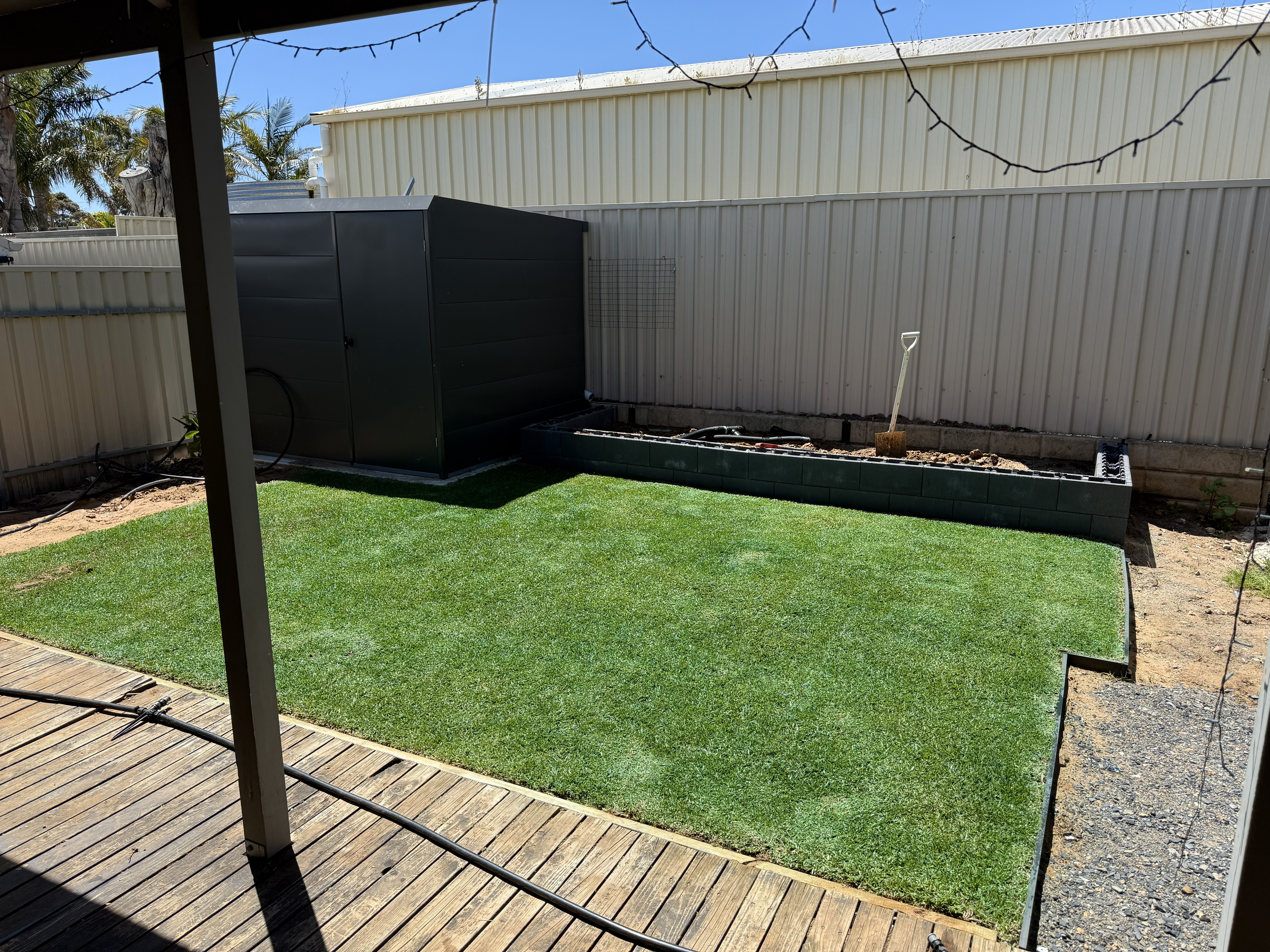 Landscaping Reynella backyard transformation with turf and garden