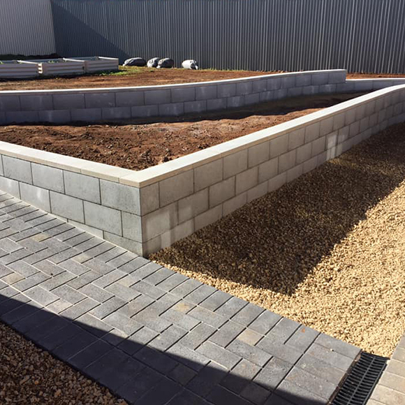 Block retaining walls Adelaide with paving and landscaping